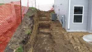 Side of House Retaining Wall | Extreme Green Lawn & Landscape | Germantown WI